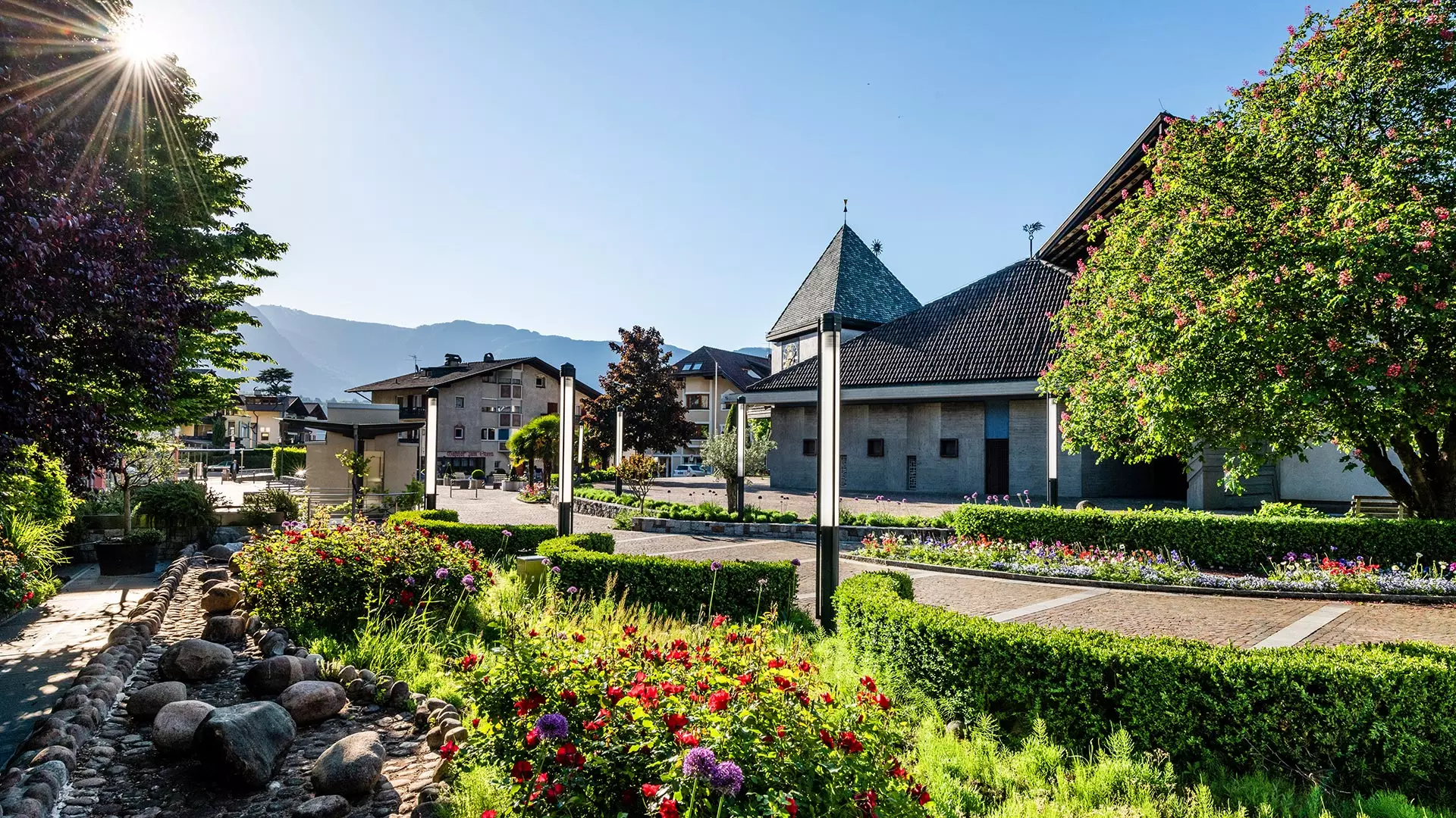 Visit the town center with its flowerbeds during your holidays in Algund